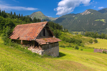 Wall Mural - Wooden house in swiss village Lungern, canton of Obwalden, Switzerland