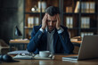 © AI_images - Overworked Hispanic man having acute headache while working in office due to frustration, fatigue and crisis