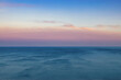 Endless sea and sky at dawn. Aerial view.