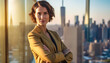 © Fabio Principe - Portrait of a businesswoman in office standing in front of a skyline of a modern city, golden hour