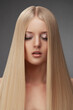 Portrait of a blonde girl with gorgeous long straight hair.
