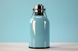a blue bottle with a silver cap