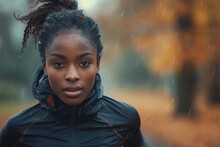 A Girl In A Rain Coat Gazes Out Into The Outdoor World, Her Human Face Hidden Beneath The Protective Layers Of Clothing As She Embodies The Resilience And Strength Of A Woman
