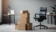 Stack of cardboard boxes and office chair in an empty office room, symbolizing moving to a new office, crisis adaptation, and the start of a new business