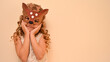 © AlyaRo - Unique child. Happy child in deer costume. Little cute girl in a carnival masquerade deer mask made of foamiran. The child is preparing to celebrate festival.