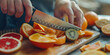 Preparing Fresh Fruit Salad. Close-up of hands skillfully slicing an assortment of fresh fruits by knife on a cutting board.