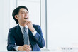 © buritora - オフィスに座る若いアジア人ビジネスマン（弁護士,税理士,会計士,行政書士,銀行員,公務員）