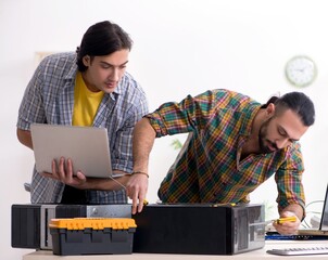 Poster - IT engineers working on hardware issue