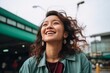 © Igor - Portrait of a beautiful young asian woman smiling in the city
