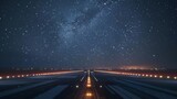 Fototapeta  - The glow of runway lights guiding planes towards the sky creating a mesmerizing contrast against the vast blanket of stars above.