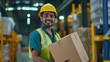 A worker lifts cardboard boxes in an operating warehouse. logistics transportation concept