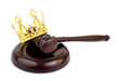 Monarchy, laws and court concept. Gold crown with judge gavel isolated on white background.