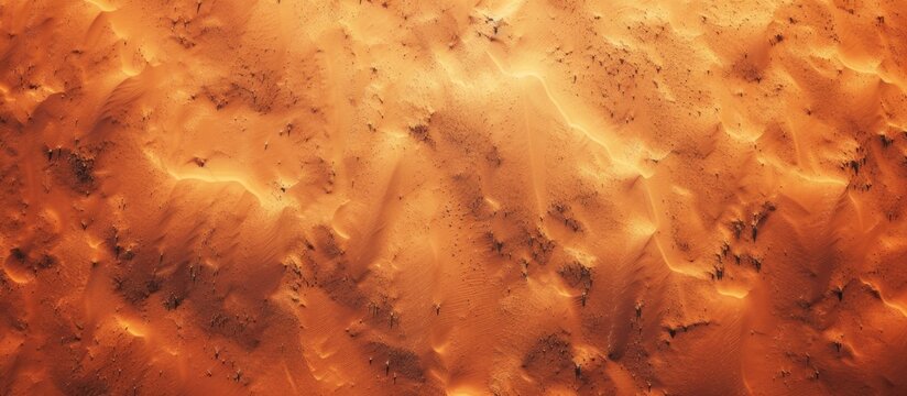 Top view aerial photograph of sandy red dirt background