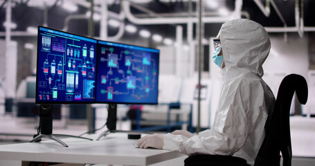 Wall Mural - Sterile Semiconductor Manufacturing Factory And Worker