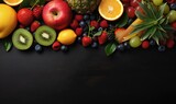 Fototapeta Kuchnia - The background is surrounded by fruit. Free space for your message