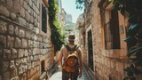 Fototapeta Uliczki - Solo traveler exploring an ancient city's narrow streets