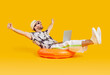 © Studio Romantic - Happy businessman entrepreneur worker finishes remote work on computer on summer holiday trip vacation. Relaxed tourist man rests on comfortable orange ring with laptop PC on yellow studio background