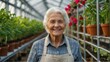 © Arceli - Elderly beautiful woman farmer inside a greenhouse with plants indoor farm smiling looking at the camera from Generative AI