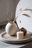 Fototapeta Tulipany - Calm still life with candles and vase, perfect for home decor inspiration. 
