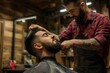 Barber cutting a handsome dark-haired man