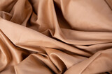 Fototapeta Tulipany - Texture of  crumpled bed linen with waves