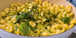 Penne pasta with herbs in bowl. Delicious homemade pasta, serving food for restaurant, menu, advert or package, close up, selective focus