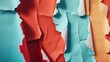 Vivid torn paper in shades of blue and red creates a dynamic collage, ideal for conceptual art and creative backgrounds.