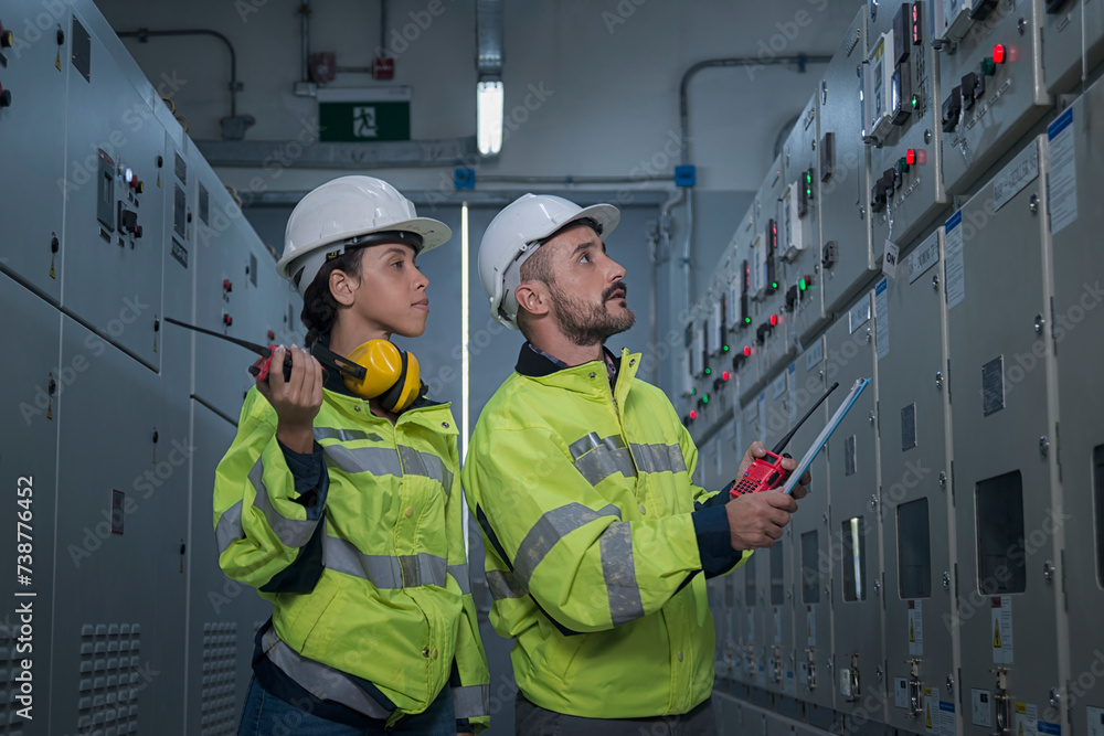 engineer working on the checking status switchgear electrical energy ...