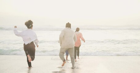 Canvas Print - Beach, playing and friends with water, running and game with fun and bonding together with happiness. Ocean, waves and people with adventure or tropical island with sunshine and excited with reunion