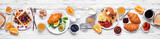 Fototapeta Uliczki - Breakfast or brunch table scene on a white wood banner background. Top view. Assorted sweet and savory food items.