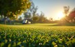 The sun is seen setting in the sky over a sprawling golf course, casting a warm glow over the manicured green fairways and tall trees. Golfers can be seen playing in the distance as the day comes to a