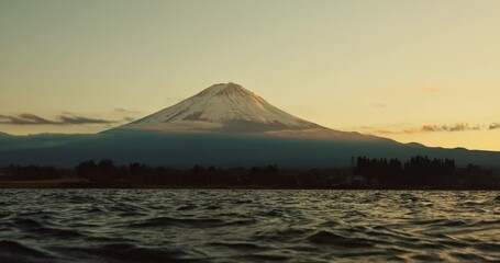 Wall Mural - Water, mountain and waves in sunset with blue sky, clouds and outdoor natural scenery in Japan. Ripples, tide and eco friendly environment of nature, lake or view of greenery in countryside on mockup