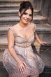 © stivog - Close up portrait of a teen brunette girl in a golden dress. Ready for prom