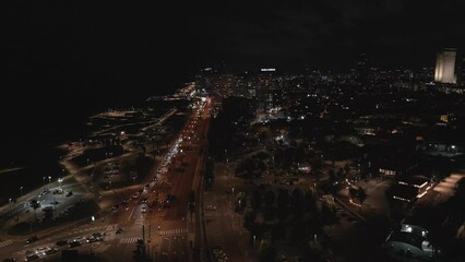 Wall Mural - Night drone scene over illuminated Tel Aviv City with traffic on the streets in Israel