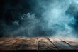 © Azar - empty wooden table with smoke float up on dark background