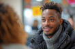 © Premium Stock  - Candid Conversation: Young Man's Engaging Smile and Winter Fashion