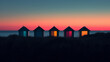 colorful wooden huts by the sea at sunrise