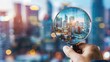 © buraratn - Man hand holding a magnifying glass, The cityscape in focus on background, business vision