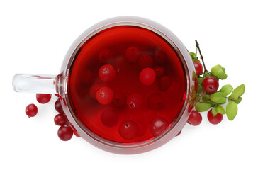 Cup of delicious cranberry tea and berries isolated on white, top view