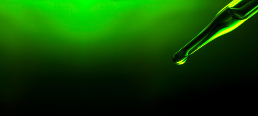 Wall Mural - macro green science experiment background,lab glassware filled with clear transparent liquids on ref