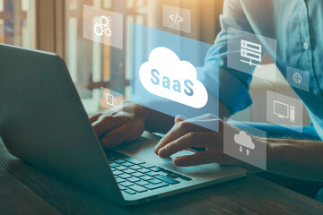 SaaS, software as a service concept, software on demand. Internet technology diagram on virtual screen.