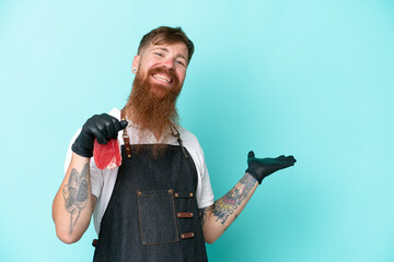 Butcher man wearing an apron and serving fresh cut meat isolated on blue background extending hands to the side for inviting to come