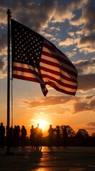 Wall Mural - Silhouettes of soldiers saluting on background of sunset