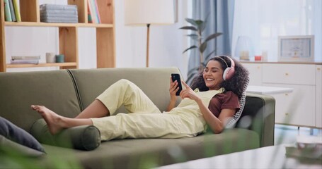 Poster - Headphones, smartphone and happy woman relax on sofa in living room with tech, music or song. Phone, sound and smile of person in home listening to audio, radio or streaming playlist on mobile app