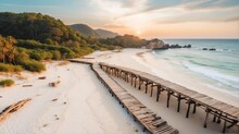 Aerial Drone Shot Of A Rugged Jetty Wooden Port On A White Sand Beach In Summer At Sunset From Generative AI