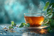Steaming tea cup surrounded by leaves on a misty background