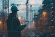 © JR-50 - An engineer on a construction site downloading detailed architectural plans and 3D models to a tablet via a 5G connection The fast download speeds are crucial for real time