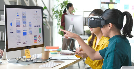 VR mobile phone application test, Asian woman with virtual reality glasses headset in VR experience, Asia business team developers for reality simulator smartphone app test at creative office, ui.