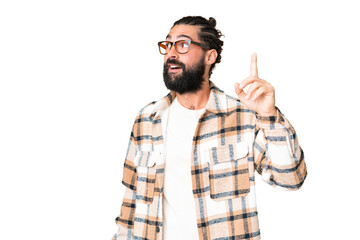 Wall Mural - Young man with beard over isolated chroma key background intending to realizes the solution while lifting a finger up