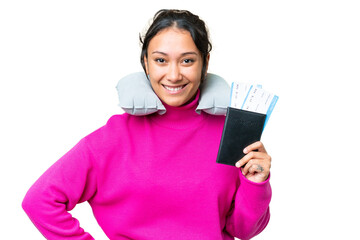 Wall Mural - Young Uruguayan woman holding a passport over isolated chroma key background posing with arms at hip and smiling